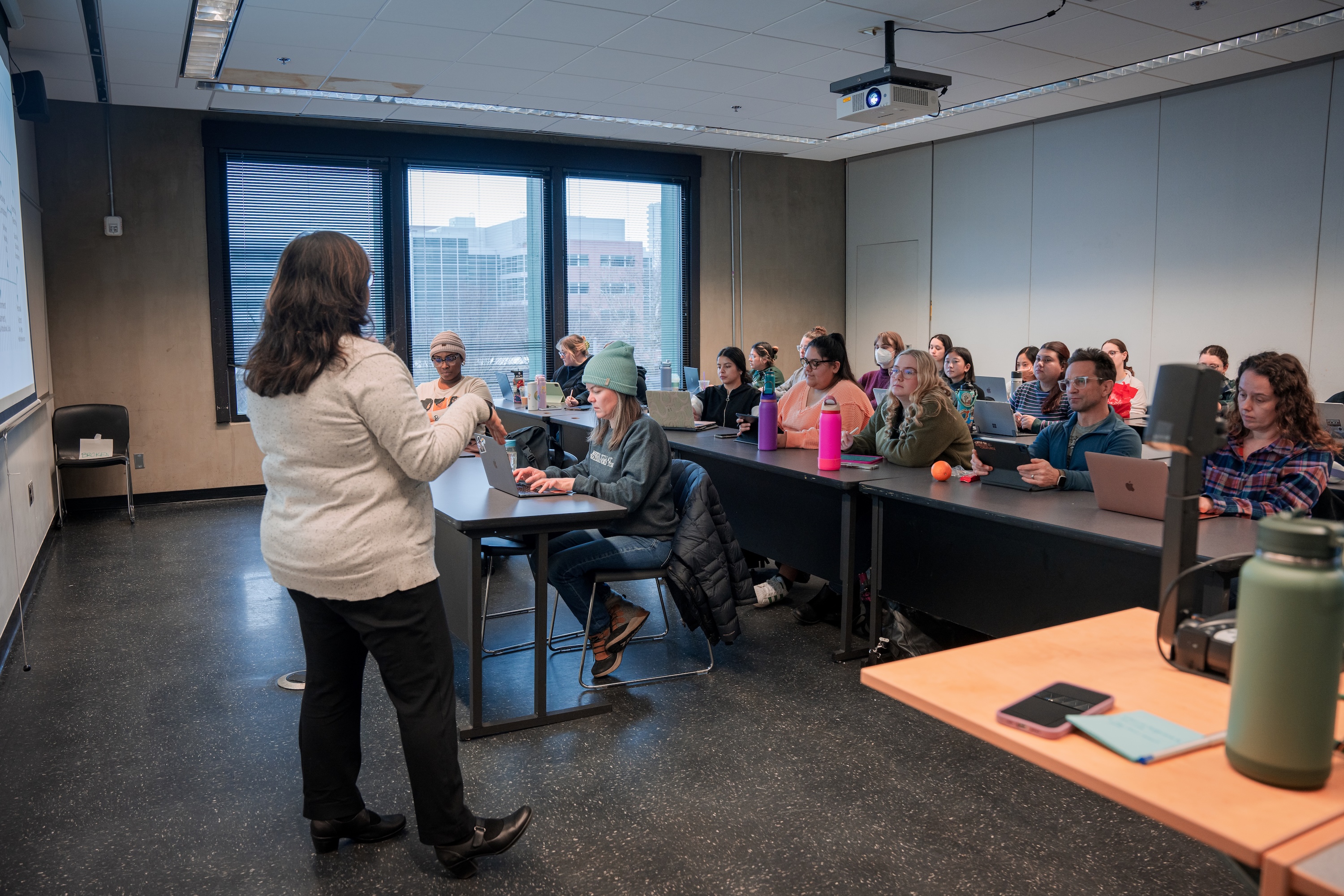 Professor in front of classroom